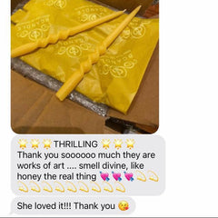Yellow bandanas with a brand logo in an open box, with a text overlay expressing satisfaction.