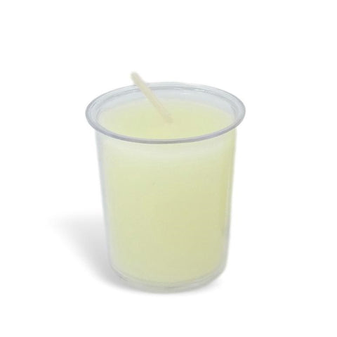 Clear plastic cup with a white candle on a white background