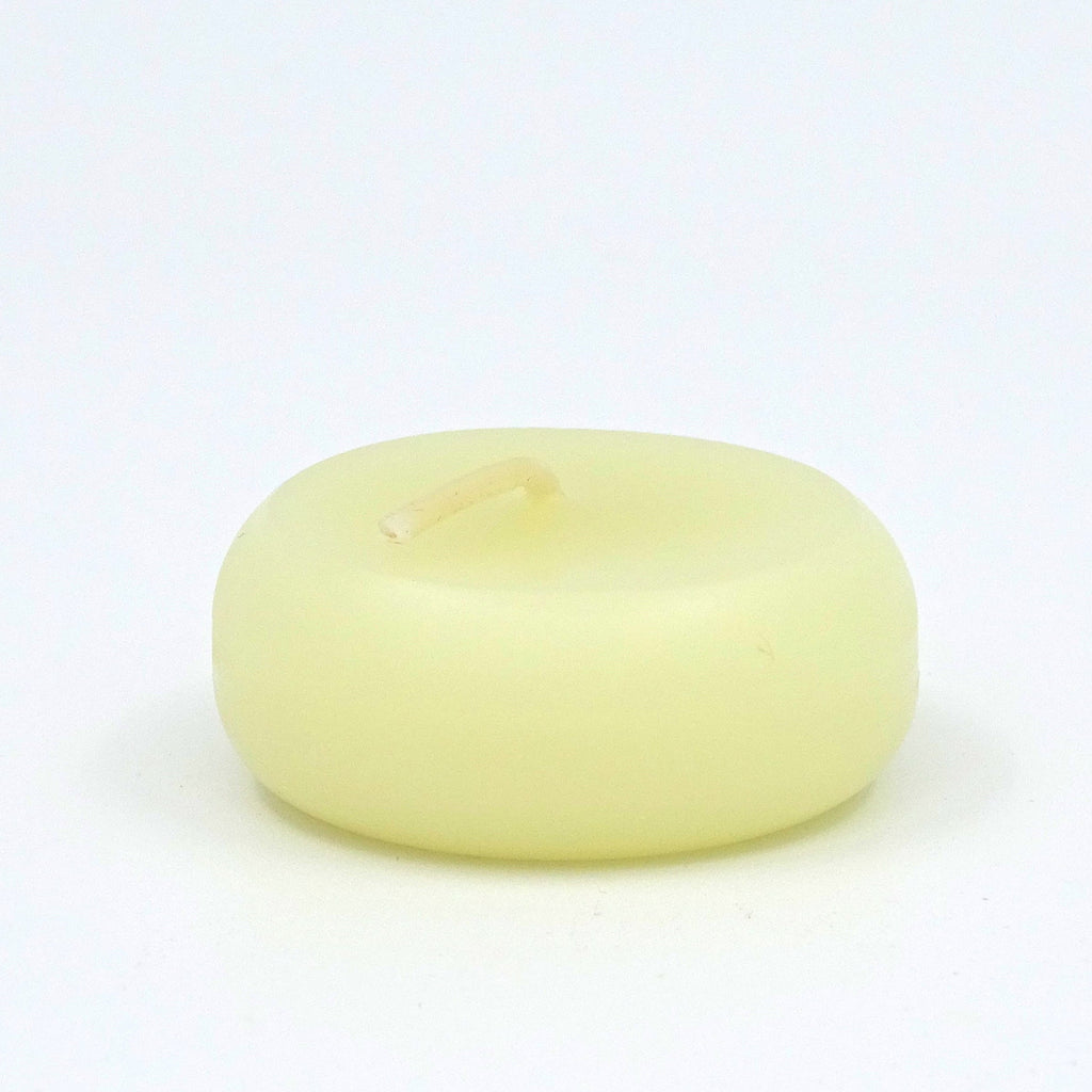 White candle on a white background