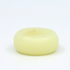 White candle on a white background
